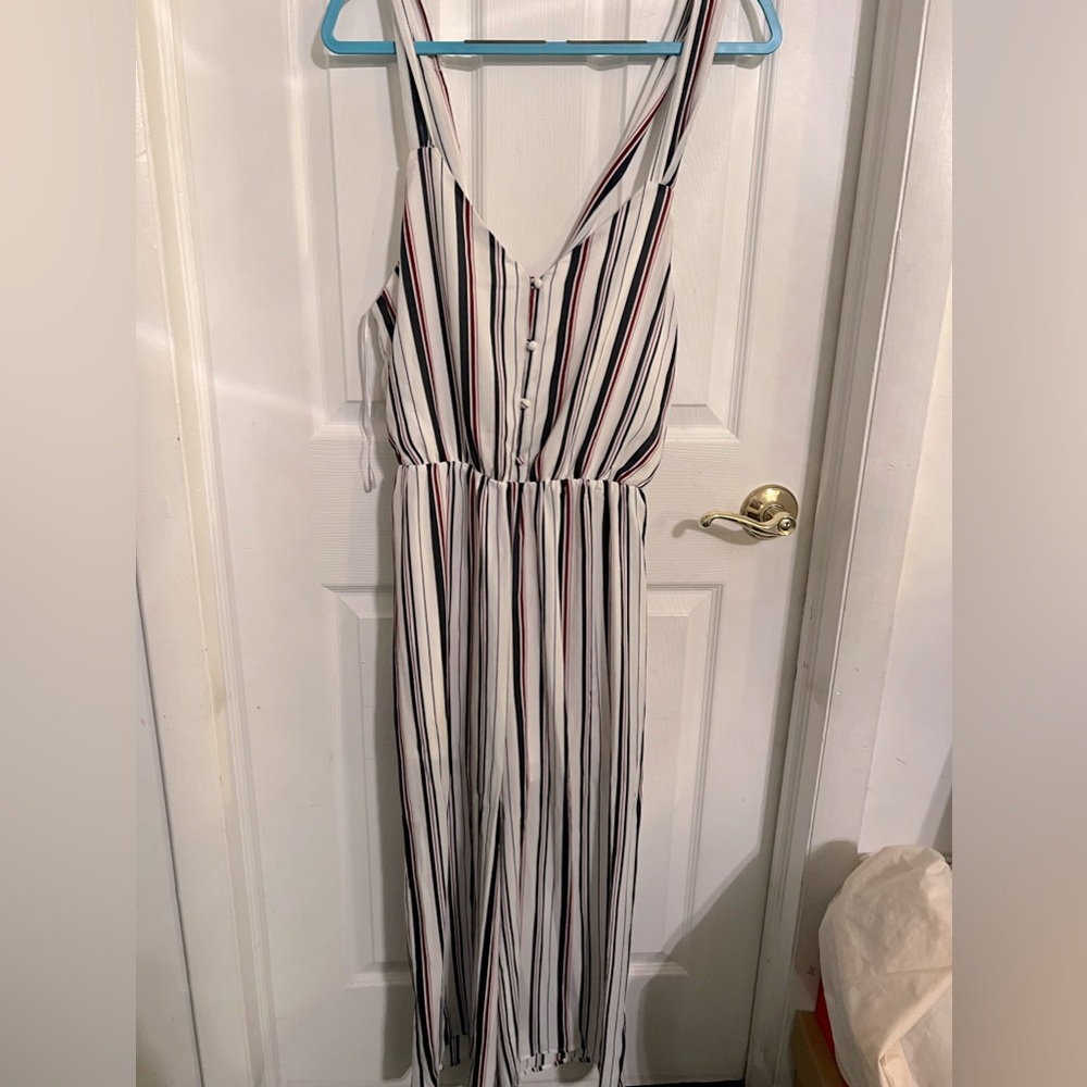 White striped jumpsuit with blue and red stripes